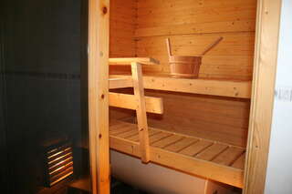 Дома для отпуска Ounasvaara Sport Cottages Рованиеми Коттедж с 2 спальнями и сауной - Pallarintie, 6-11
